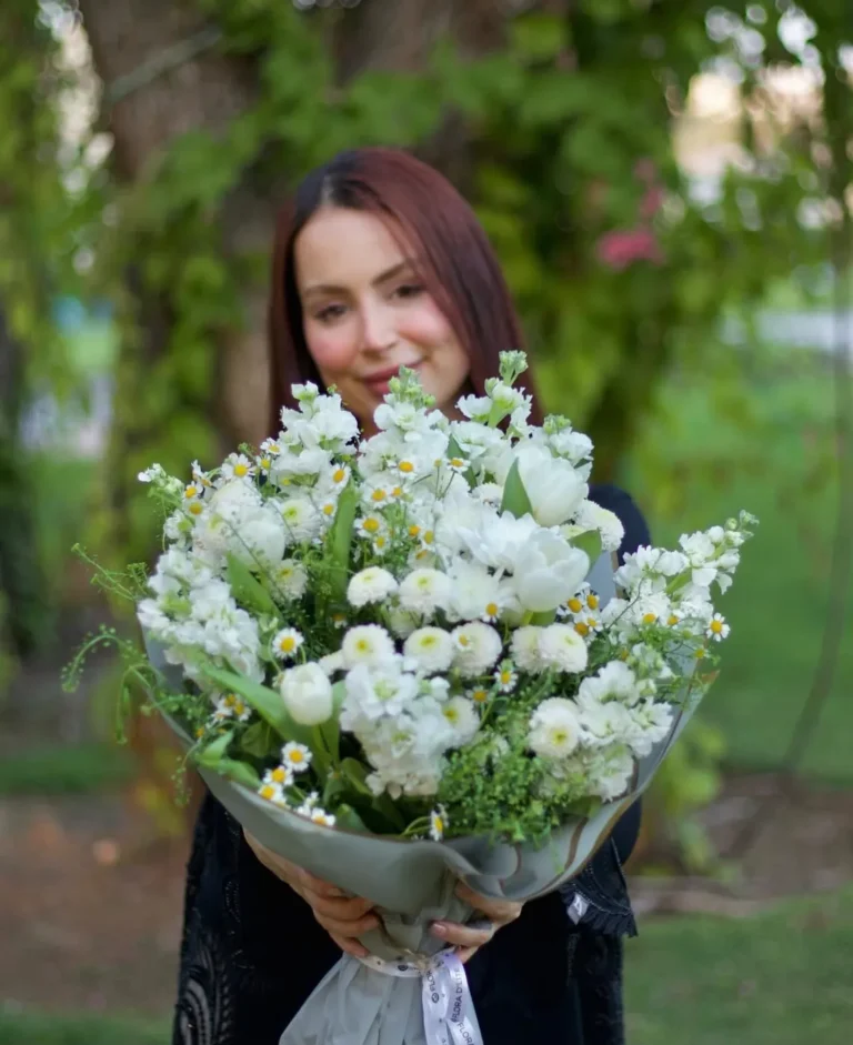 Lifestyle portrait with white bouquet — MICC International photography
